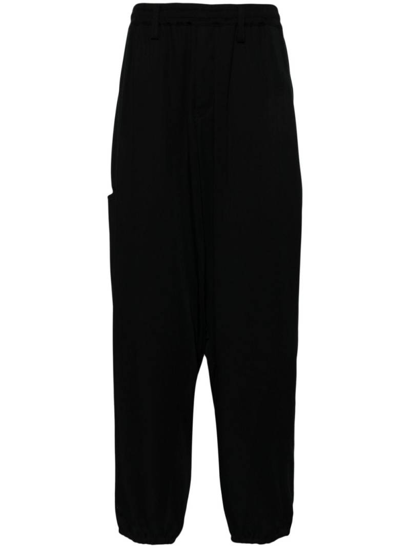 Yohji Yamamoto high-waist tapered trousers - Black von Yohji Yamamoto