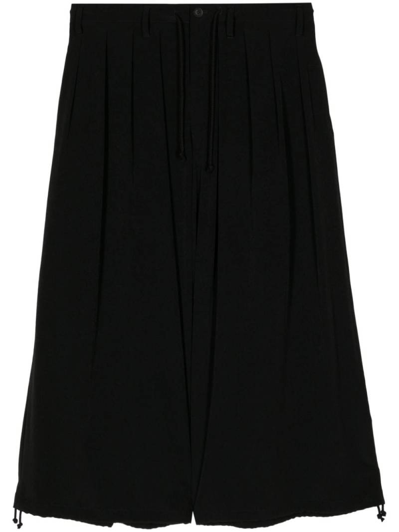 Yohji Yamamoto wide-leg cropped trousers - Black von Yohji Yamamoto