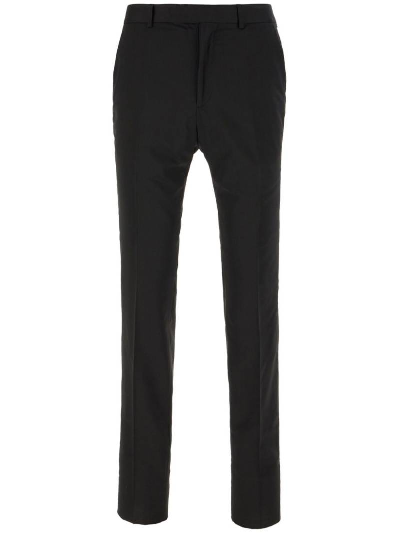 Zegna pressed-crease tapered trousers - Black von Zegna