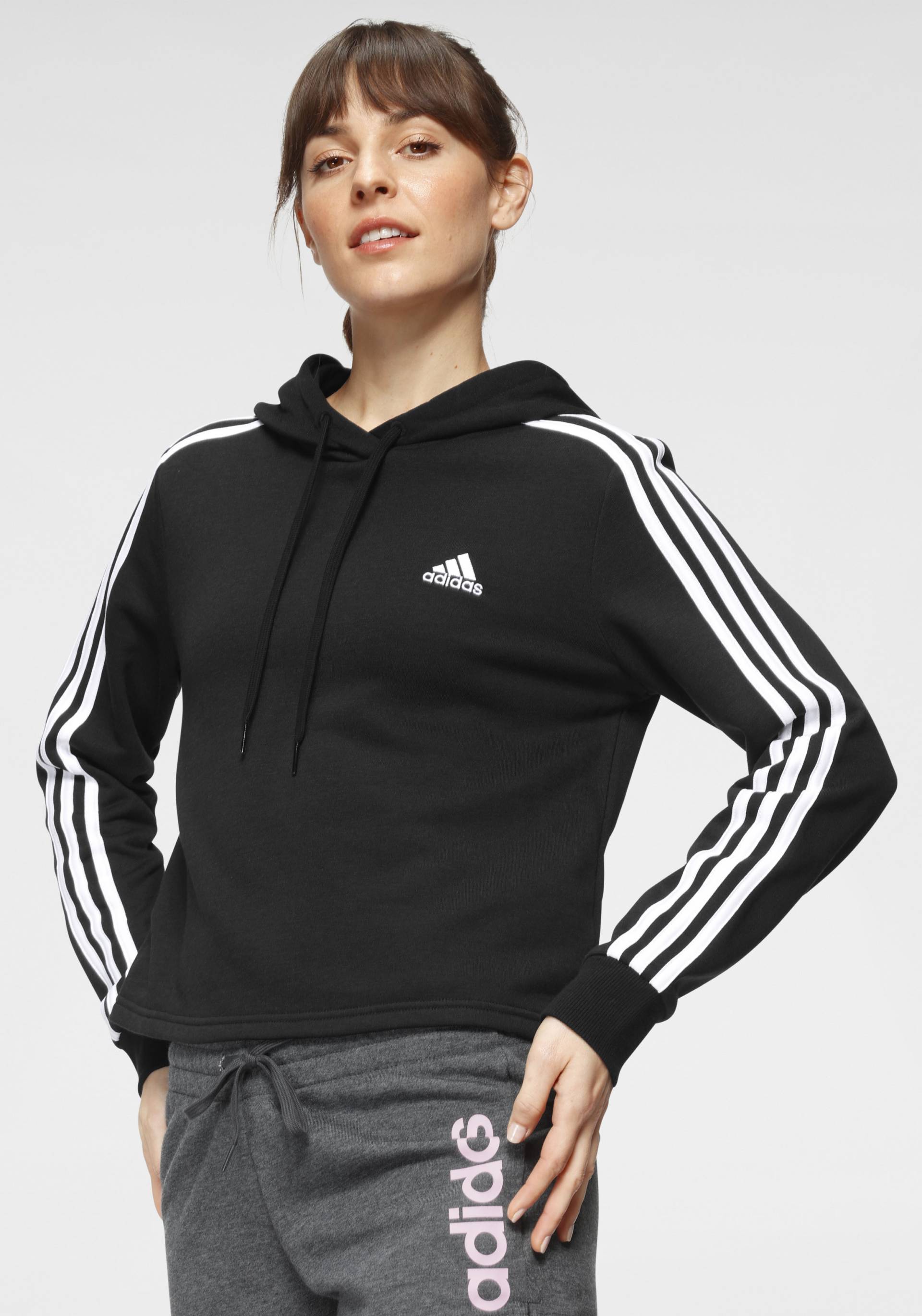 adidas Sportswear Kapuzensweatshirt »ESSENTIALS 3-STREIFEN CROPPED HOODIE« adidas Sportswear Kapuzensweatshirt »ESSENTIALS 3-STREIFEN CROPPED HOODIE« von adidas Sportswear