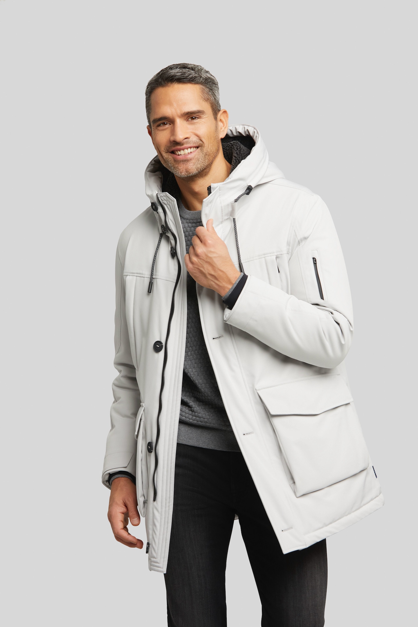 bugatti Regenjacke, mit Kapuze, mit Futter aus recycelter Watte bugatti Regenjacke, mit Kapuze, mit Futter aus recycelter Watte von bugatti