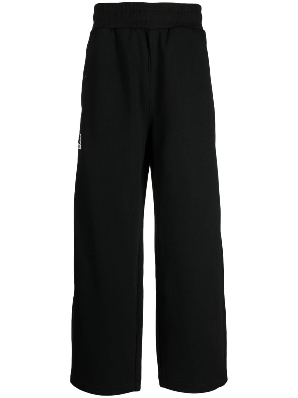 izzue logo-appliqué wide-leg trousers - Black von izzue