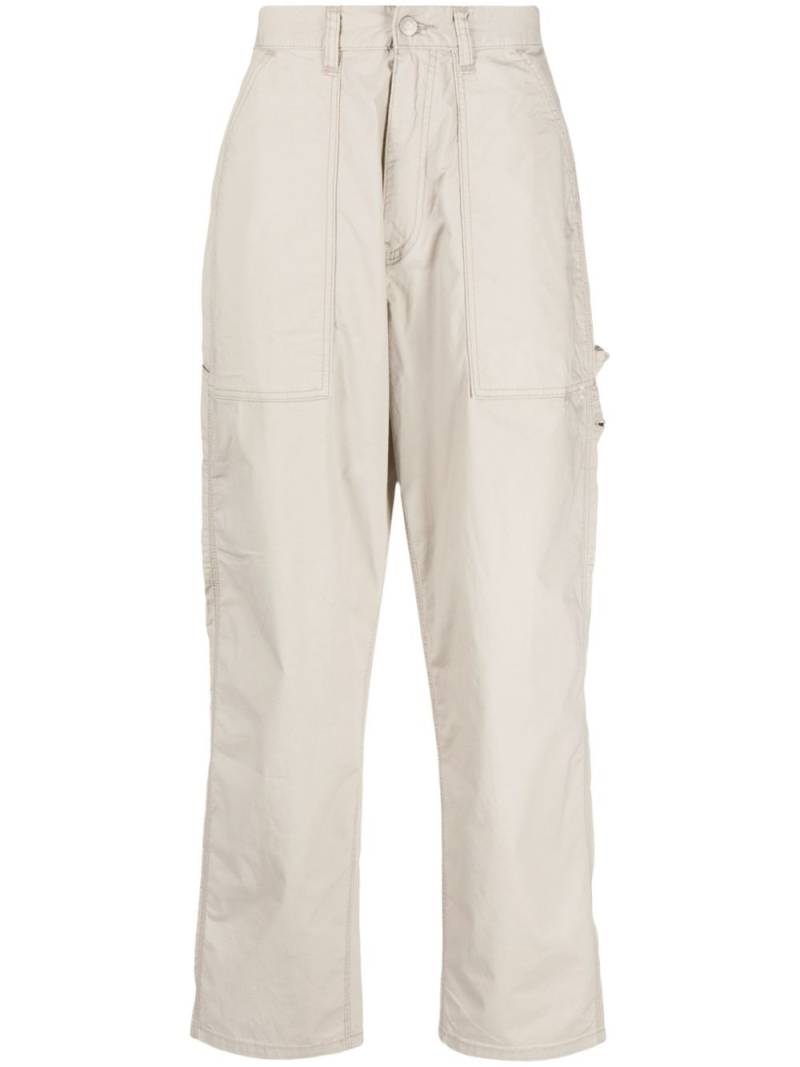 izzue logo-patch cargo trousers - Neutrals von izzue