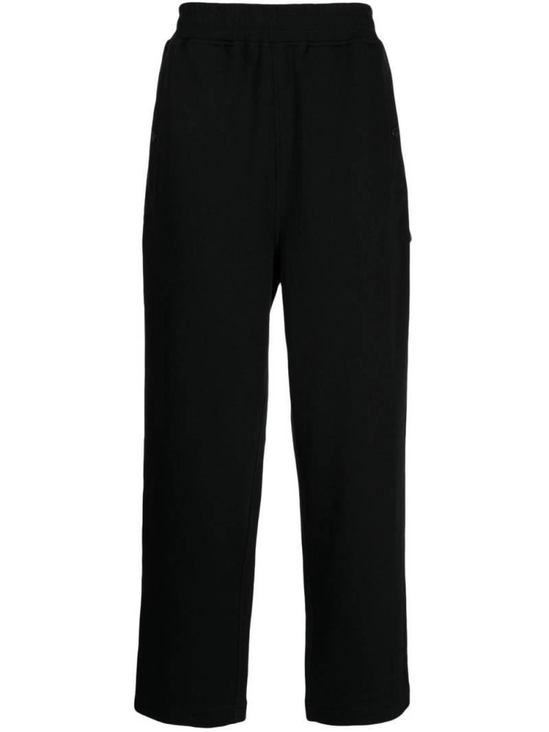 izzue logo-patch elasticated-waistband track pants - Black von izzue