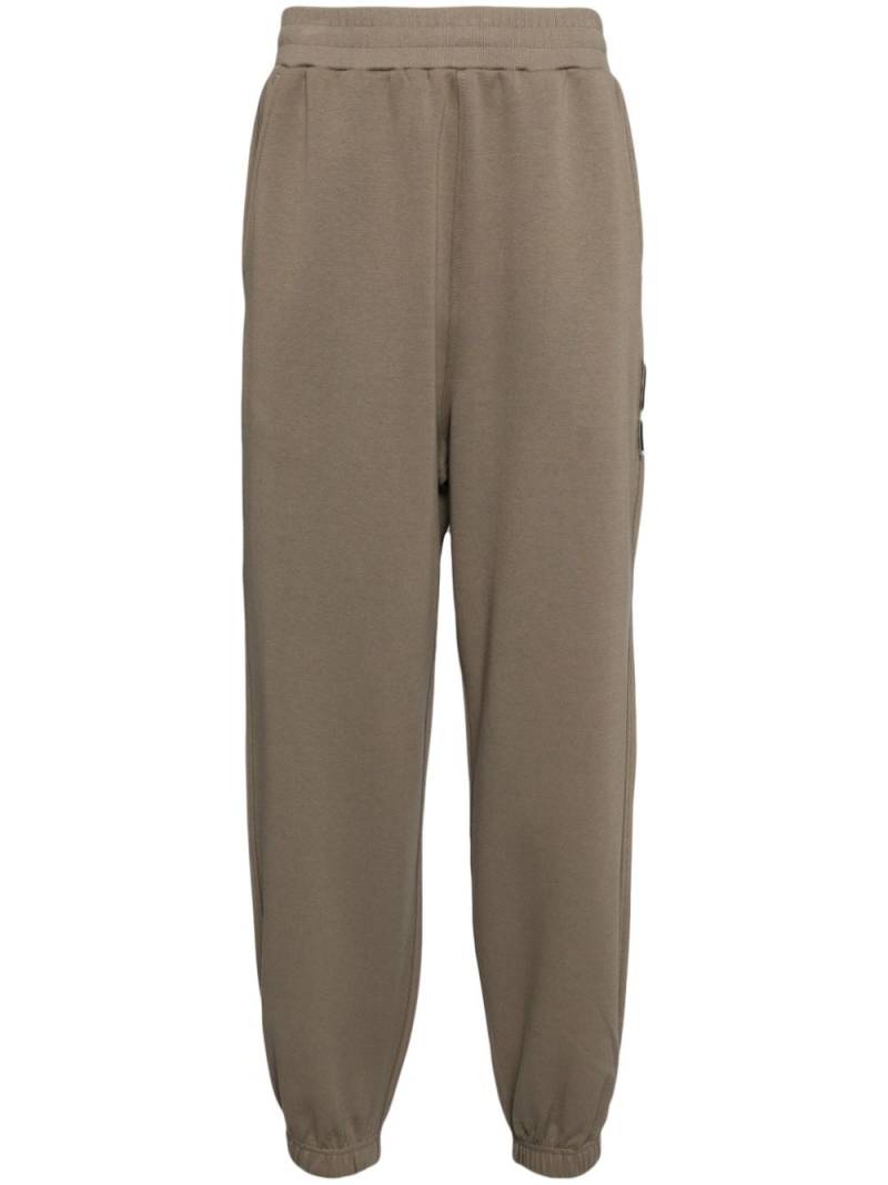 izzue logo-patched track pants - Brown von izzue