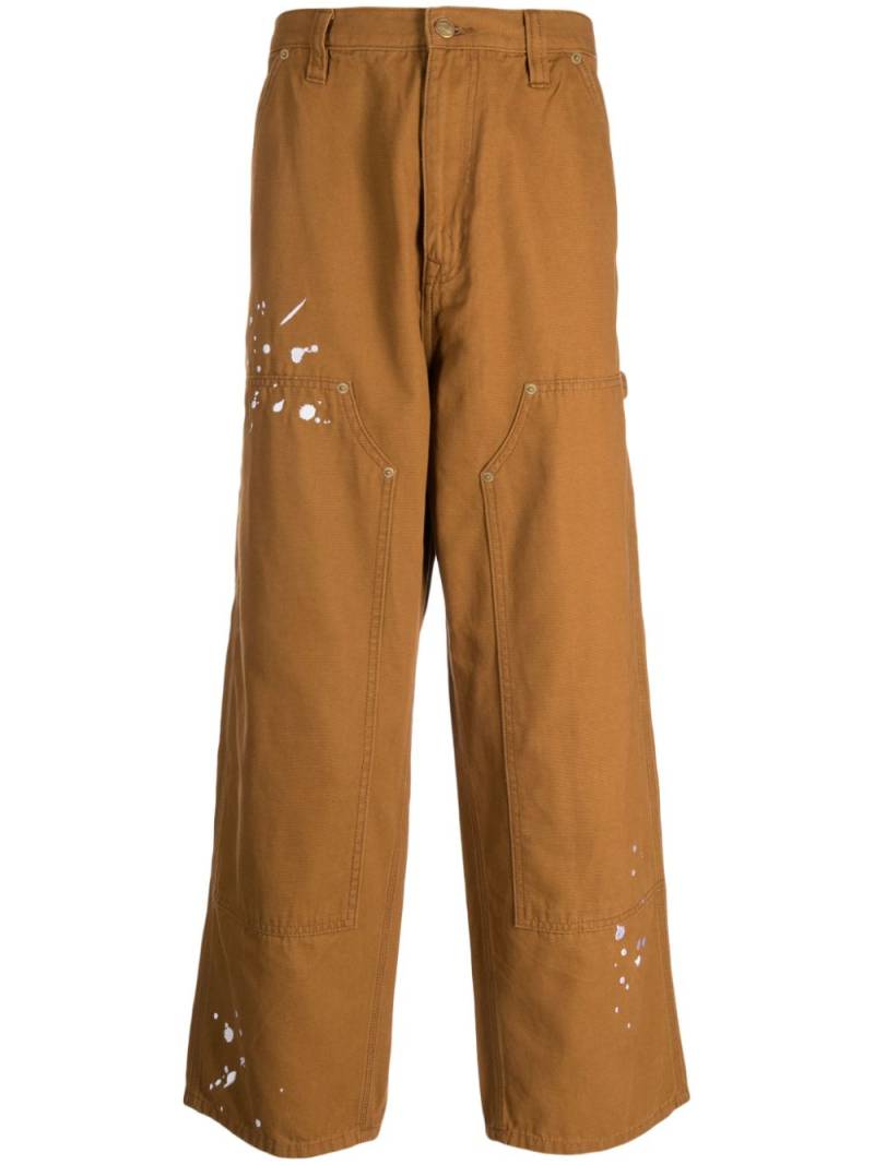 izzue paint-splatter straight trousers - Brown von izzue