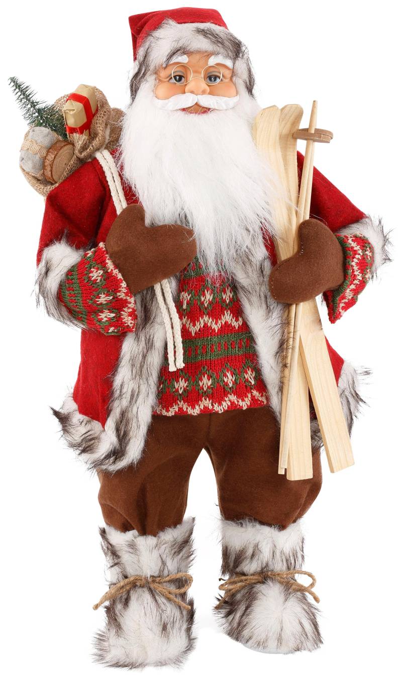 HOSSNER - HOMECOLLECTION Weihnachtsmann »Santa mit Skiern unter dem Arm und Geschenken«, Weihnachtsdeko, Dekofigur, Weihnachtsfigur von HOSSNER - HOMECOLLECTION