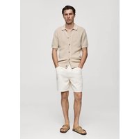 Geknöpftes Strick-Poloshirt mit Lochmuster Geknöpftes Strick-Poloshirt mit Lochmuster von mango man