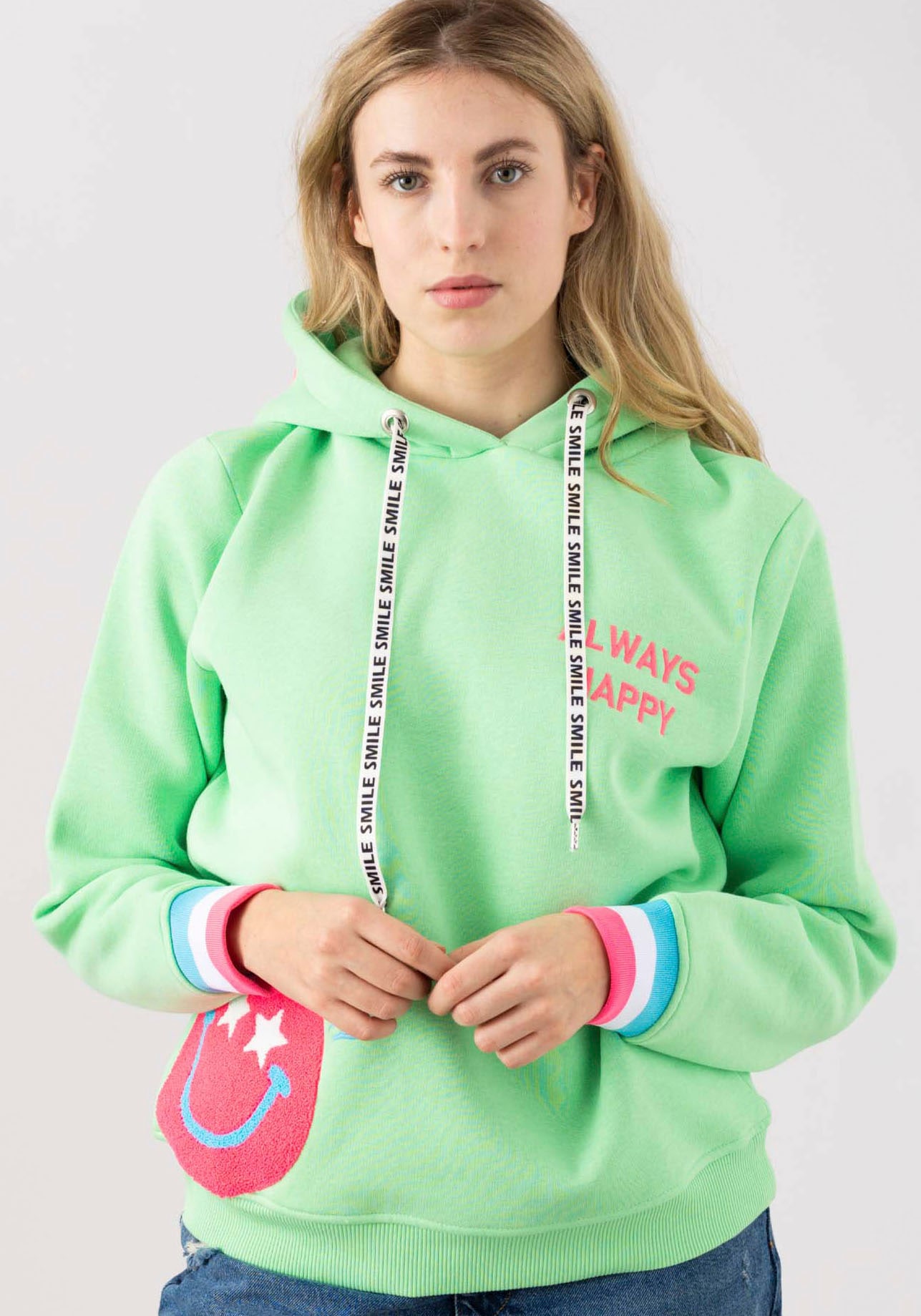 Zwillingsherz Hoodie »Always Happy«, mit Smiley Aufdruck aus Frottee und Neon Details Zwillingsherz Hoodie »Always Happy«, mit Smiley Aufdruck aus Frottee und Neon Details von zwillingsherz